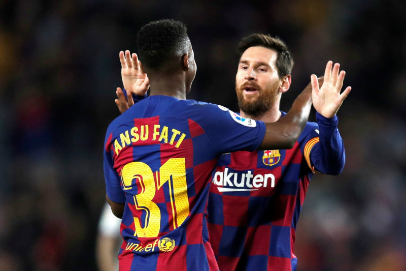 Messi y Ansu Fati celebrando 