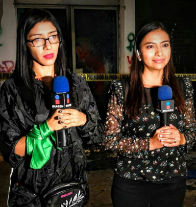 Jafet Tirado (izquierda) durante una cobertura