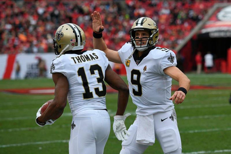 El QB y WR de New Orleans celebrando un touchdown