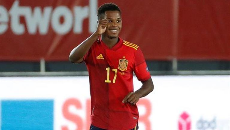 Ansu celebra su primer gol con España