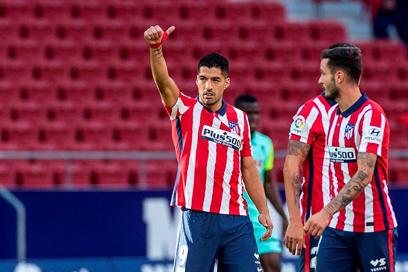 Suárez festeja un gol con el Atlético de Madrid 