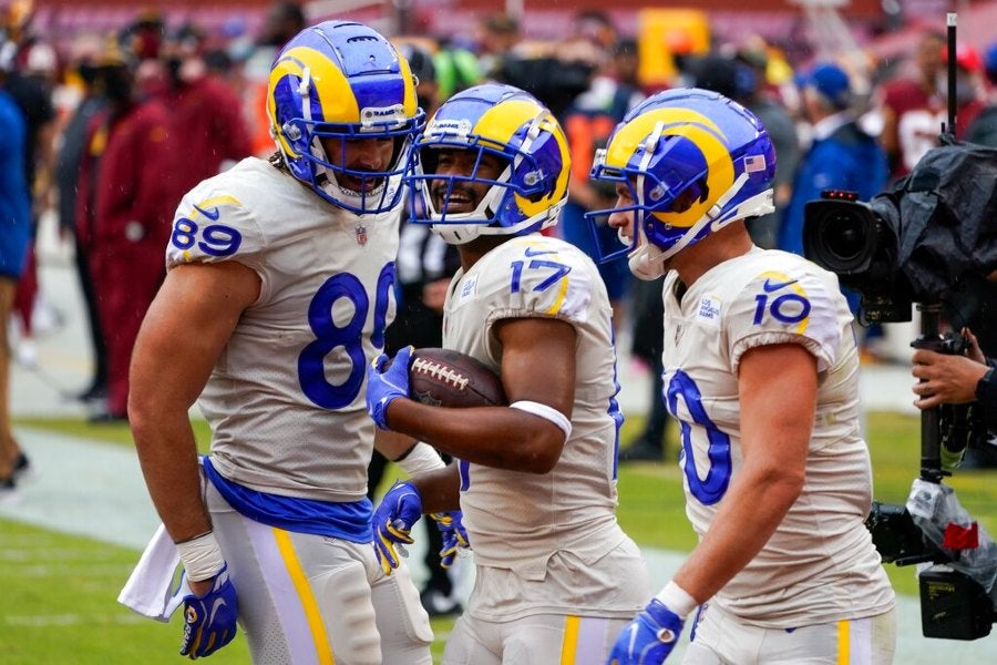 Jugadores de Rams celebran TD vs Washington