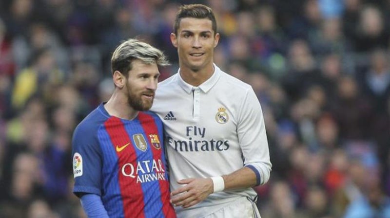 Messi y CR7 durante un Clásico en España 