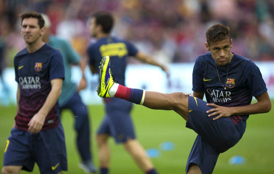 Messi y Neymar en calentamiento con el Barcelona