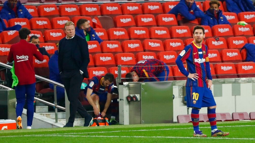 Koeman y Messi en un partido con el Barcelona 