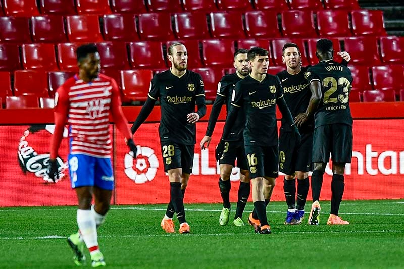 Messi celebra uno de sus goles ante Granada 