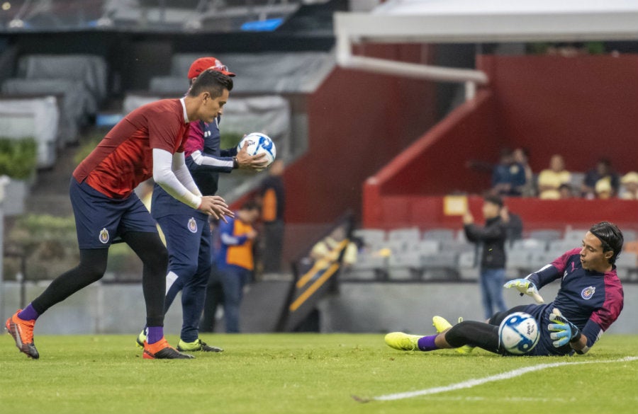 Gudiño y Toño Rodríguez en calentamiento