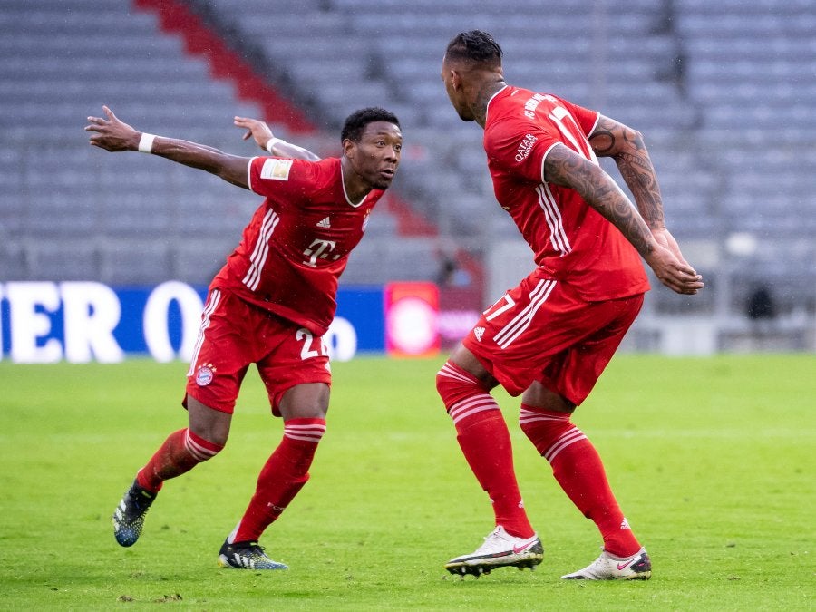 David Alaba festejando con Jerome Boateng el primer gol del partido