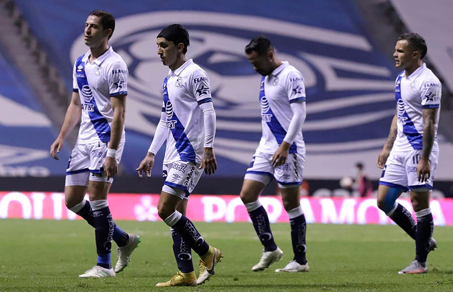 Jugadores del Puebla tras igualar con Rayados