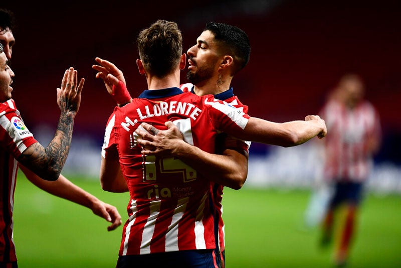 Jugadores colchoneros celebrando un gol