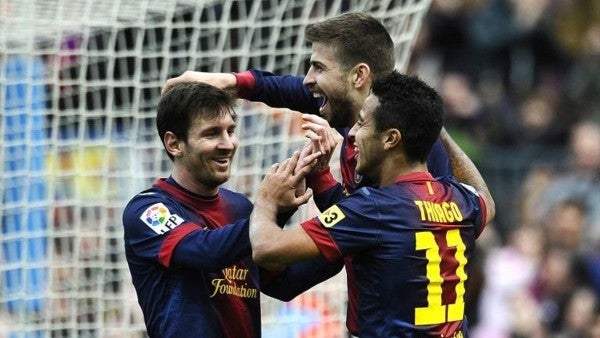 Messi, Piqué y Thiago en partido del Barcelona celebran