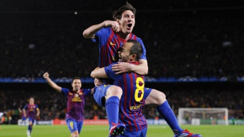 Iniesta y Messi celebrando un gol a favor del Barcelona