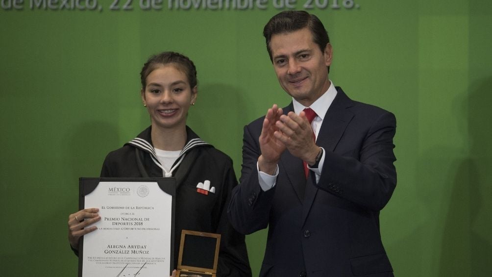 González recibiendo el PND