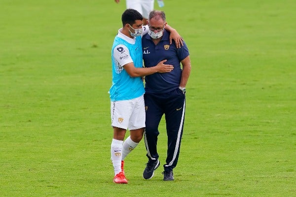 Erick Lira y Andrés Lillini tras un partido