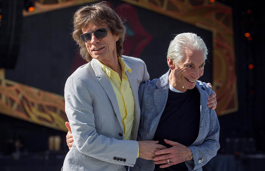 Watts con Mick Jagger