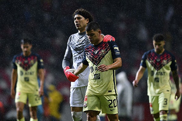 Jugadores de América tras la derrota