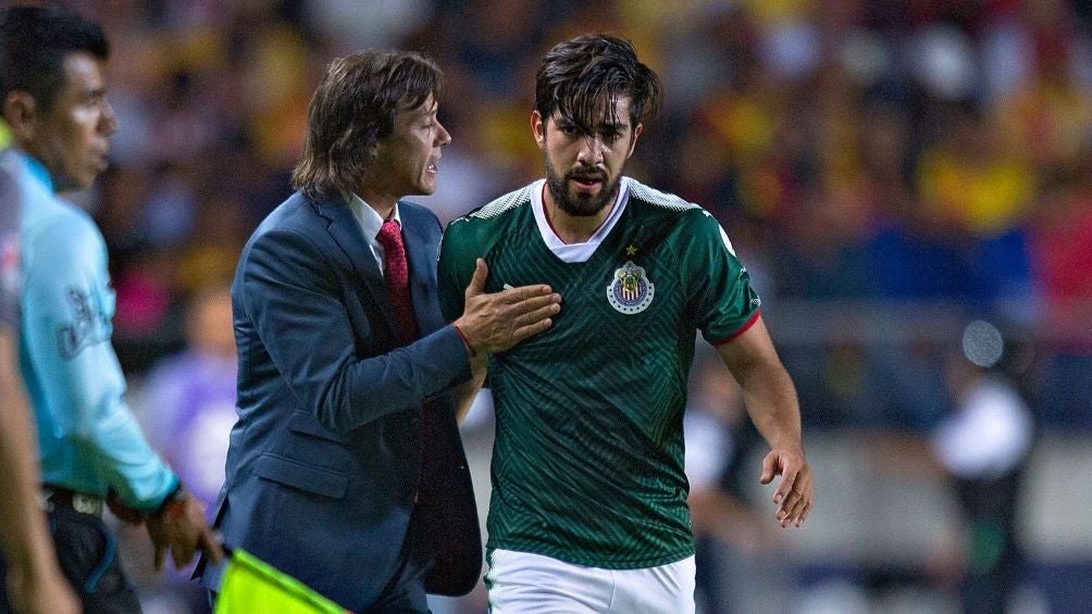 Almeyda con Rodolfo Pizarro