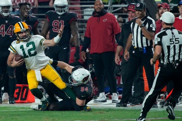  Aaron Rodgers en acción durante partido