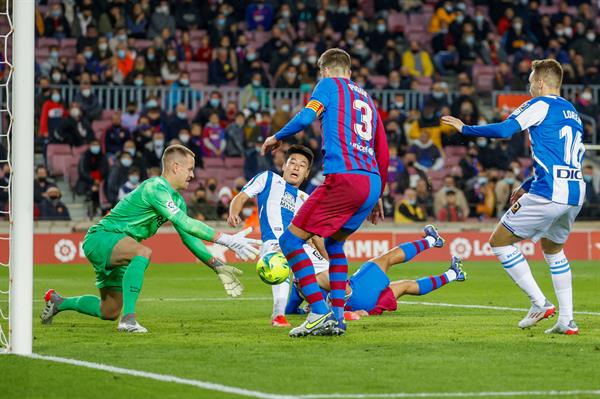 Barcelona en acción frente al Espanyol