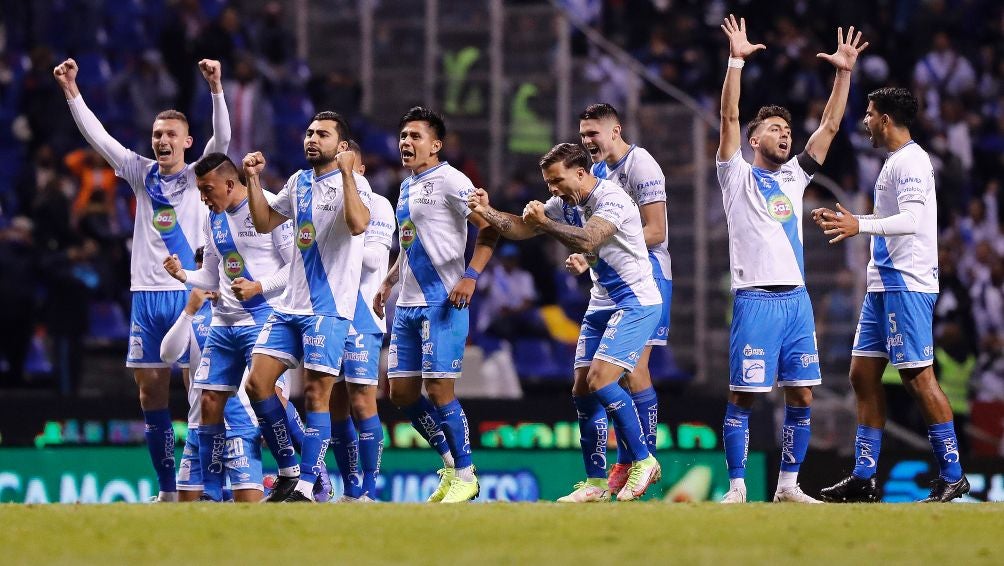 Jugadores del Puebla en festejo