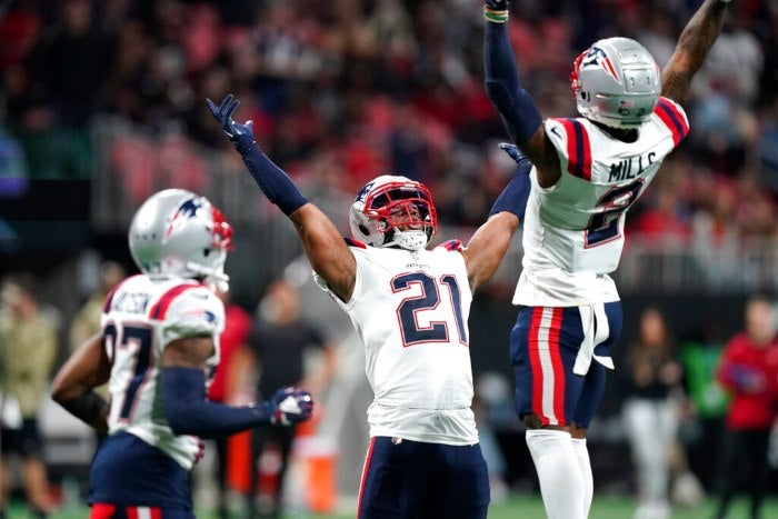 Jugadores de New England Patriots en festejo