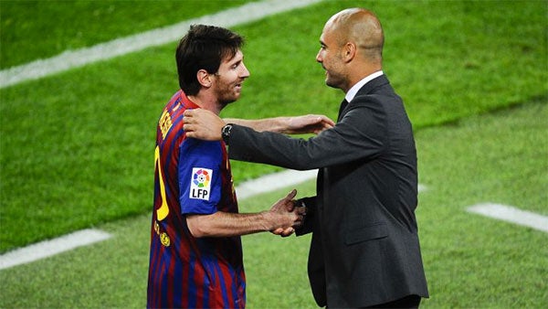 Messi junto a Pep Guardiola 