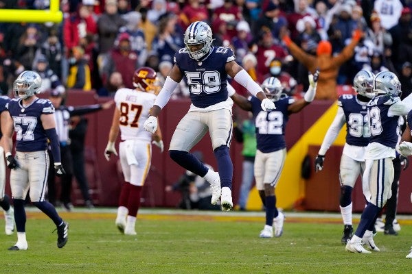 Jugador de los Cowboys celebra durante partido