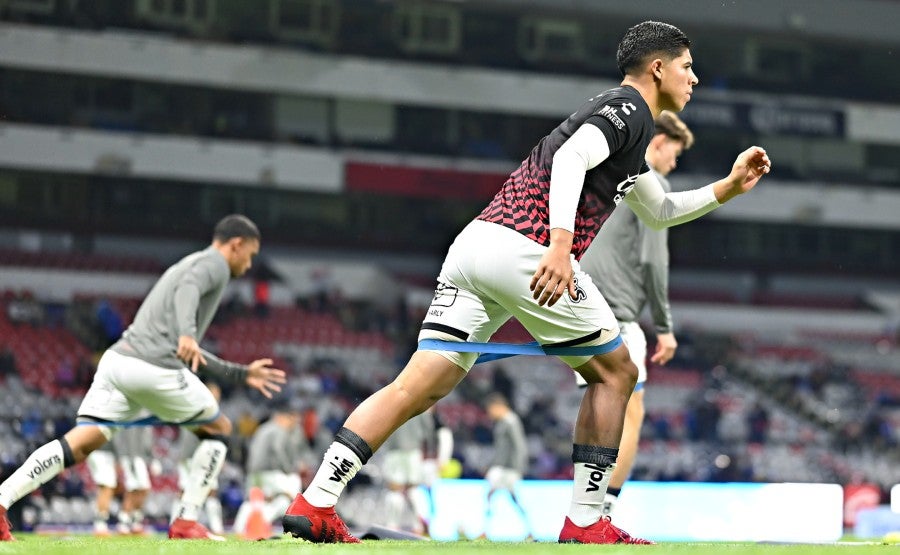 Jugadores de Xolos en calentamiento