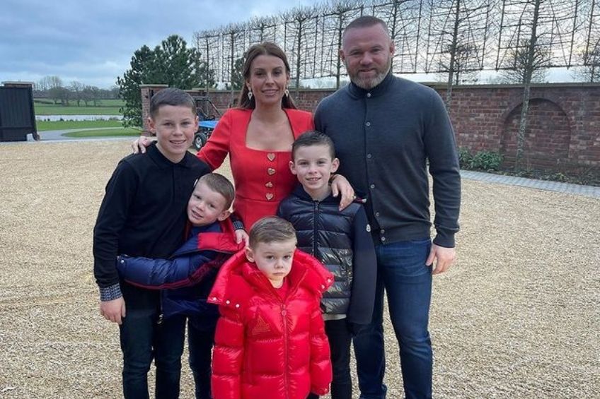 Wayne Rooney junto a su familia