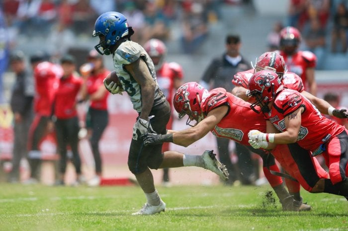 Acción en la semana de comodines de la Liga de Futbol Americano Profesional