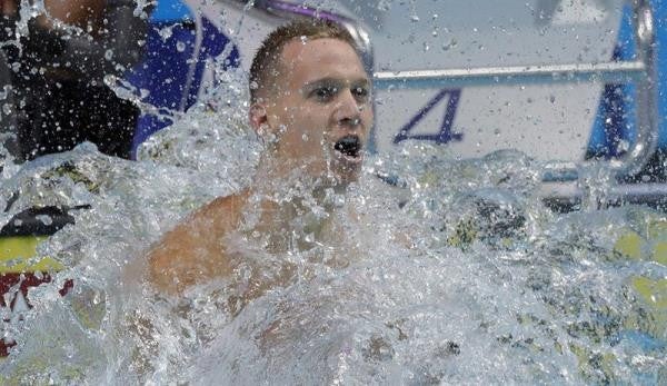 Dressel tras vencer en la Final de los 100m mariposa masculinos