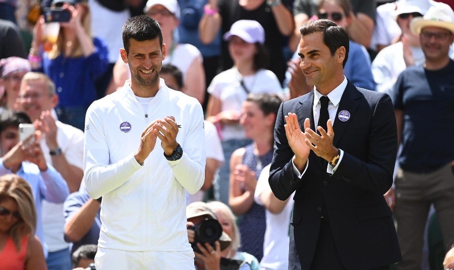 Federer con Novak Djokovic