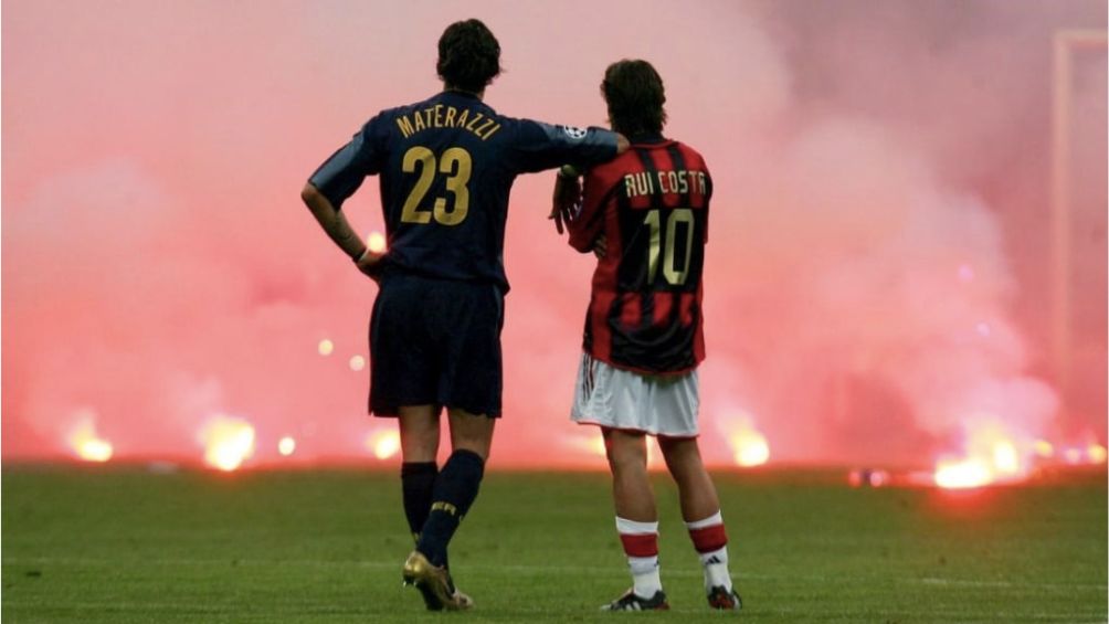 Materazzi y Rui Costa en un derby