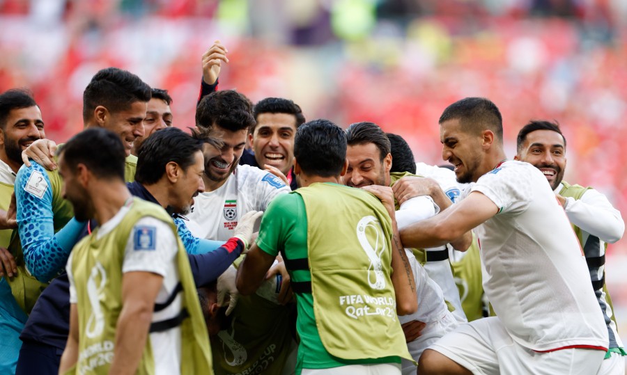 La Selección de Irán celebrando la victoria ante Gales