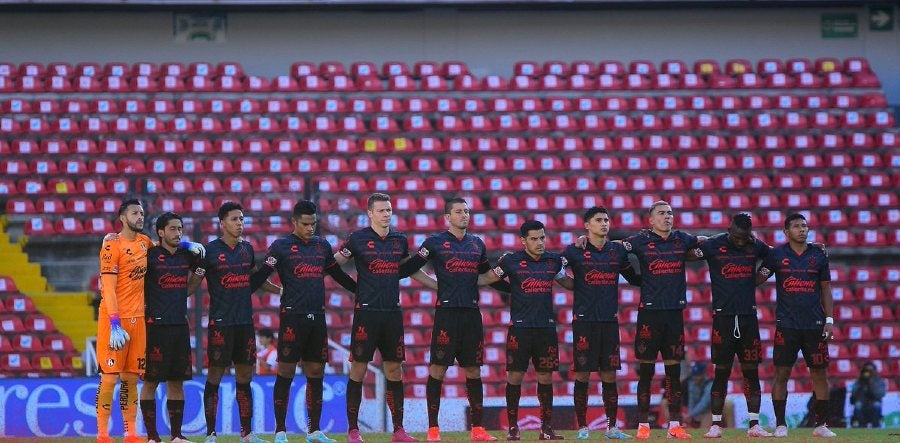 Jugadores de Atlas reunidos antes del partido