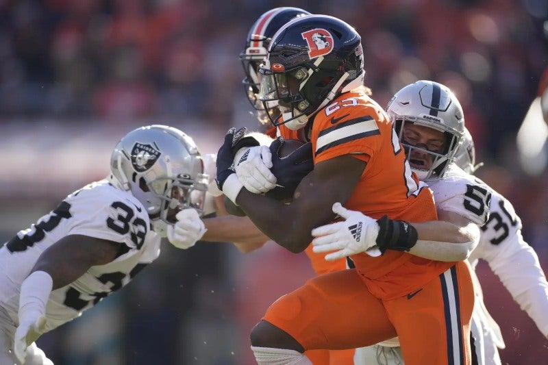  Gordon jugando con los Denver Broncos