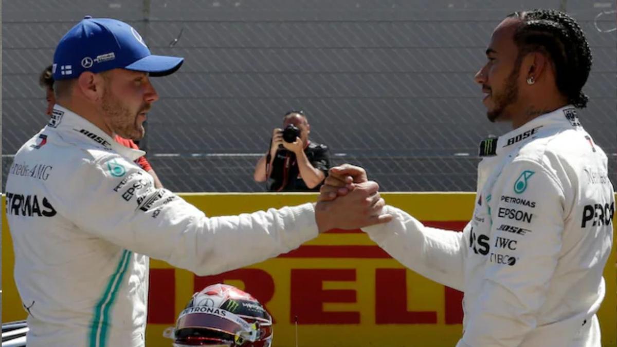 Hamilton junto a Valterri Bottas | AP