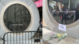 Ciudadanos de Dublín dejan flores en portal 