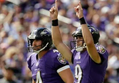 Jugadores de Cuervos celebran en juego de Semana 1