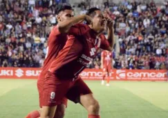 Jugadores del Club Deportivo Tepatitlán festejan un gol