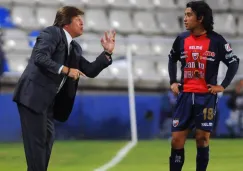 Herrera da indicaciones a su pupilo