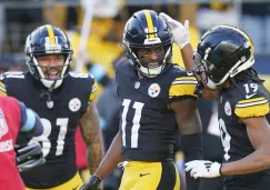 Wilson lanza para 2 touchdowns y los Steelers superan 27-14 a Browns