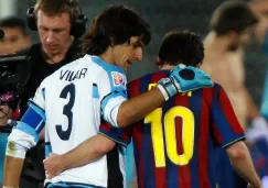 Vilar conversando con Lionel Messi