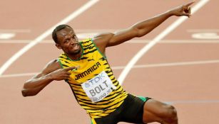 Bolt realiza su tradicional festejo tras ganar una competencia