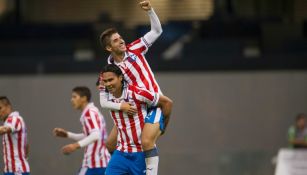 Brizuela y Peña celebran uno de los tres goles frente al América