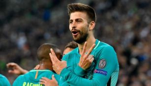 Gerard Piqué festeja un gol con el Barcelona en Champions League