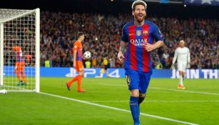 Leo Messi festeja un tanto con el Barcelona en Champions League