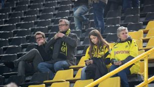 Seguidores del Borussia Dortmund, sentados en las tribunas