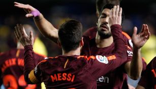 Messi y Suárez celebran un gol en un partido