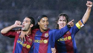 Ronaldinho junto a Rafa Márquez y Puyol